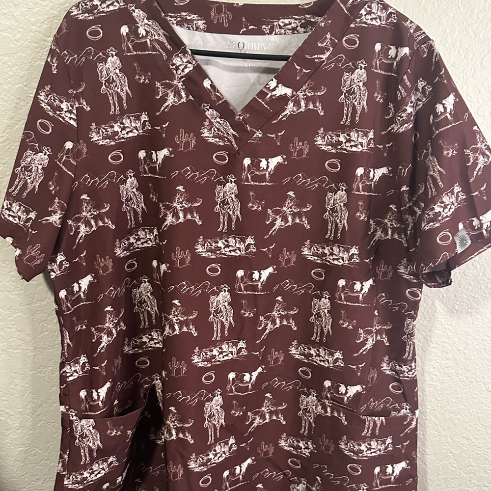 Spurrin scrubs TOP ONLY. Cowboy themed.